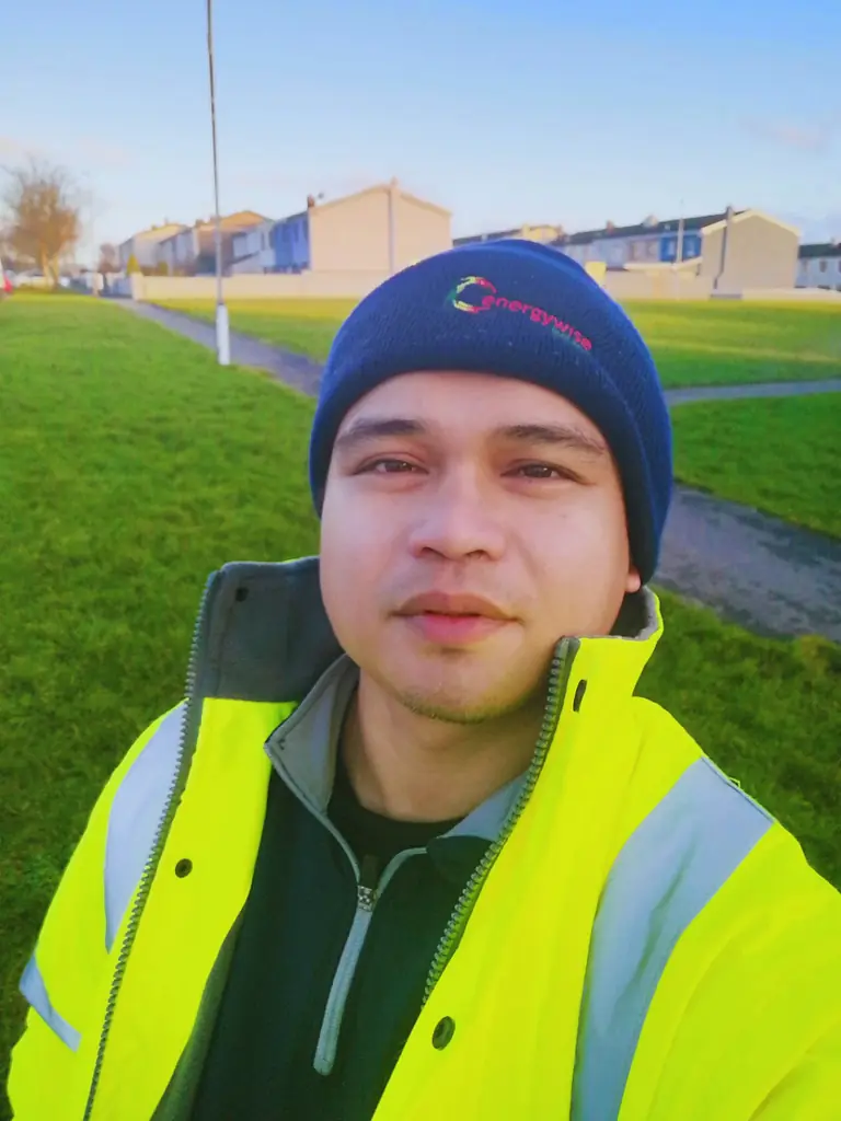 Worker in high-visibility clothing outdoors
